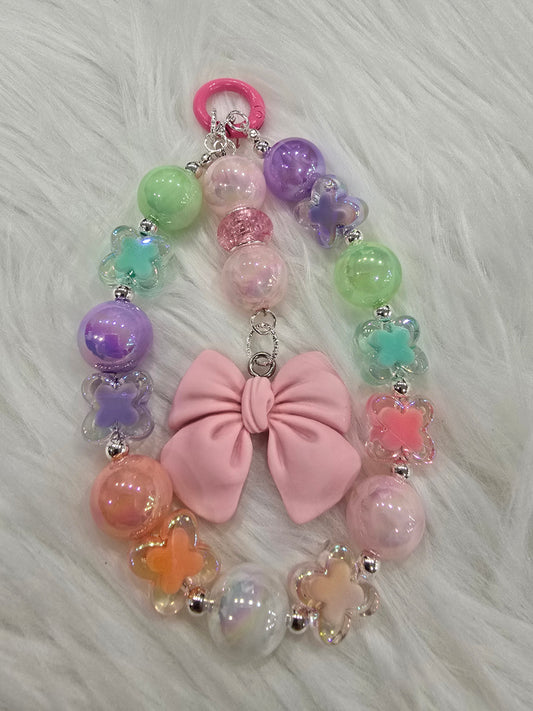 Pastel butterfly with bow phone charm