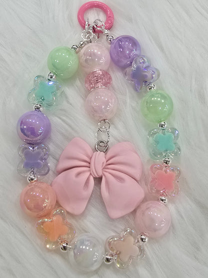 Pastel butterfly with bow phone charm