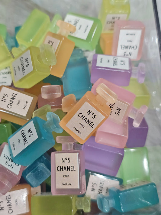 Bottle of perfume charms mix