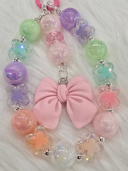 Pastel butterfly with bow phone charm